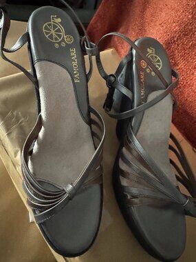 Famolare silver and gold iconic hi ups; size W7.5/8. Never worn, no box